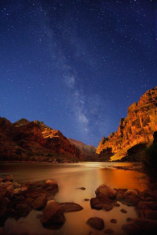 Night Sky on the Colorado River with the Milky Way and night sky cliffs.