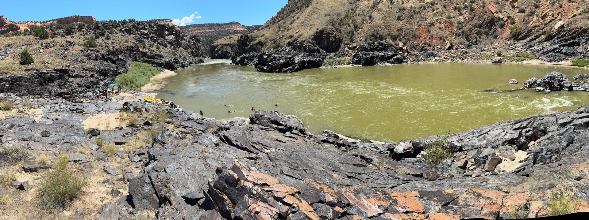 Rocky landscape with green water.