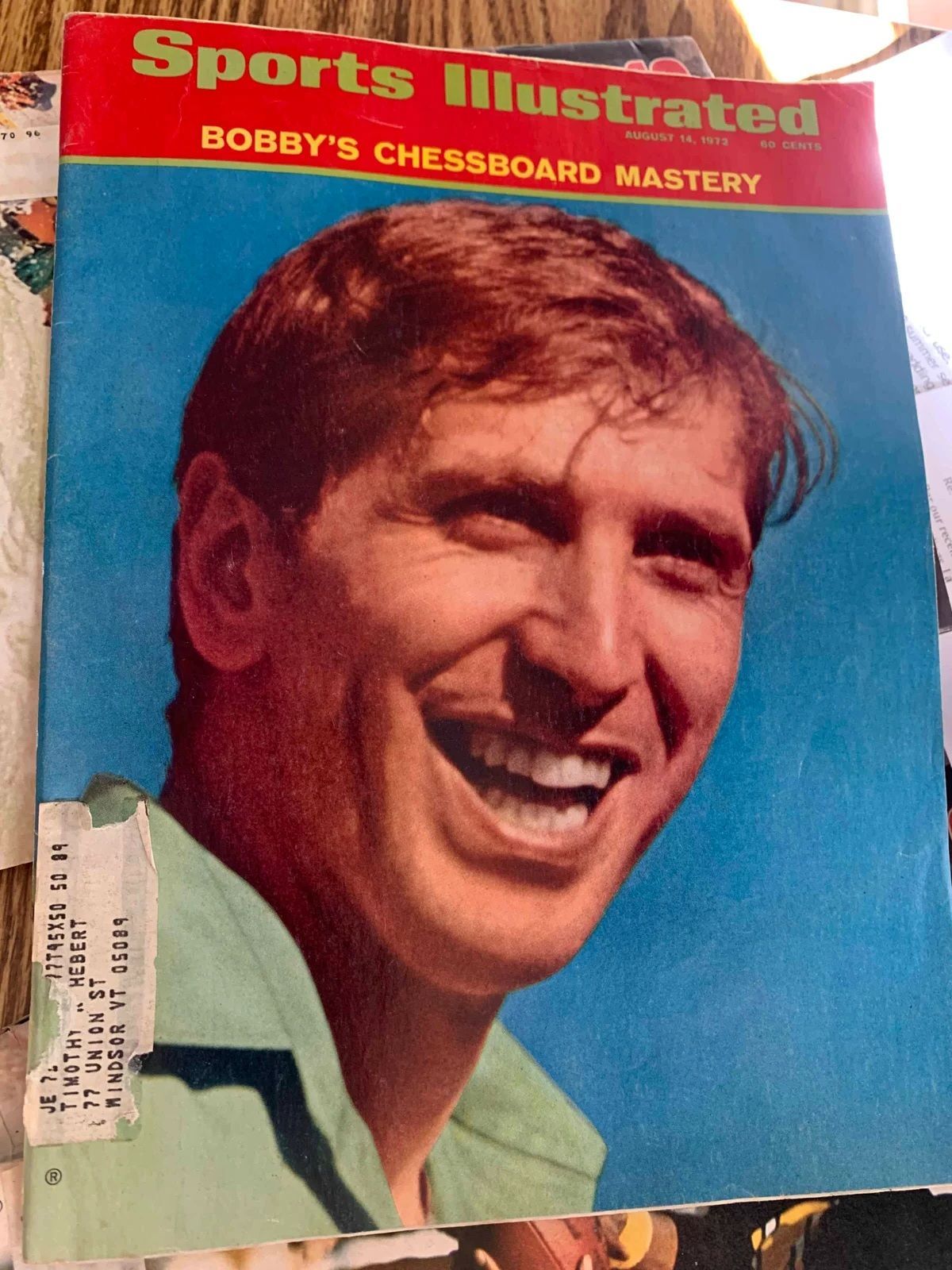 Sports Illustrated cover featuring Bobby Fischer, smiling, with headline