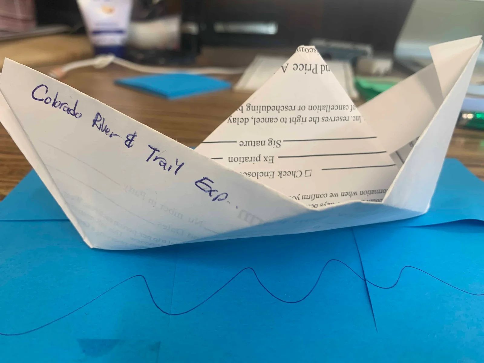 Paper boat labeled