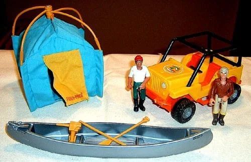 Toy camping set with tent, jeep, canoe, and two figures.
