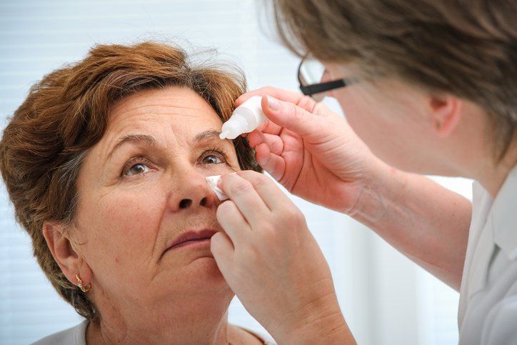 Dry Eyes and Ocular Allergies — Doctor Helps The Patient and Give Eye Drops in San Antonio, TX