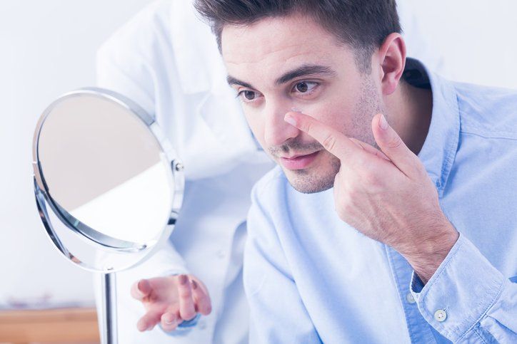 Contact Lens Packages — Man Wearing Contact Lenses in San Antonio, TX