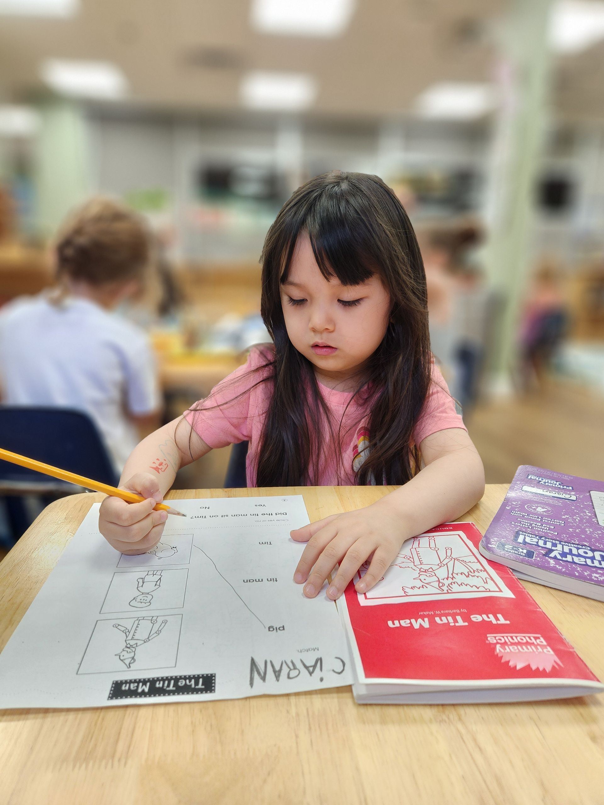 montessori child working in the classroom