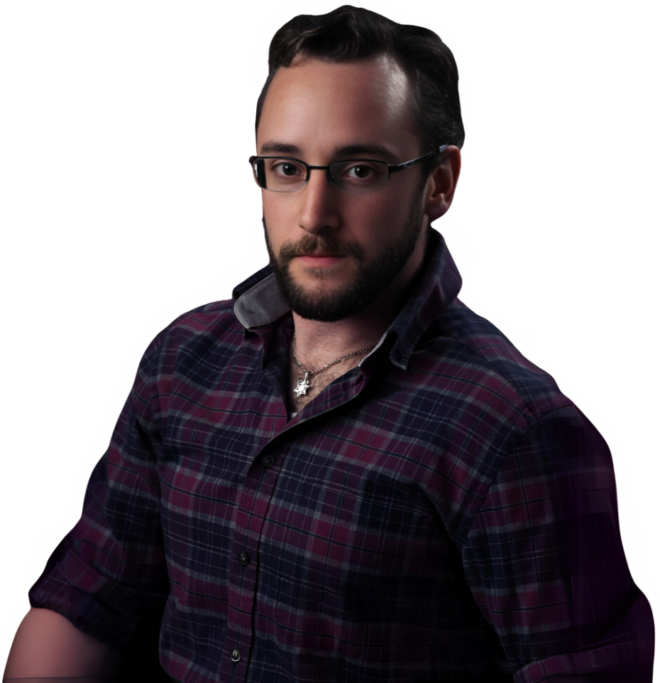 A man with a beard wearing glasses and a plaid shirt