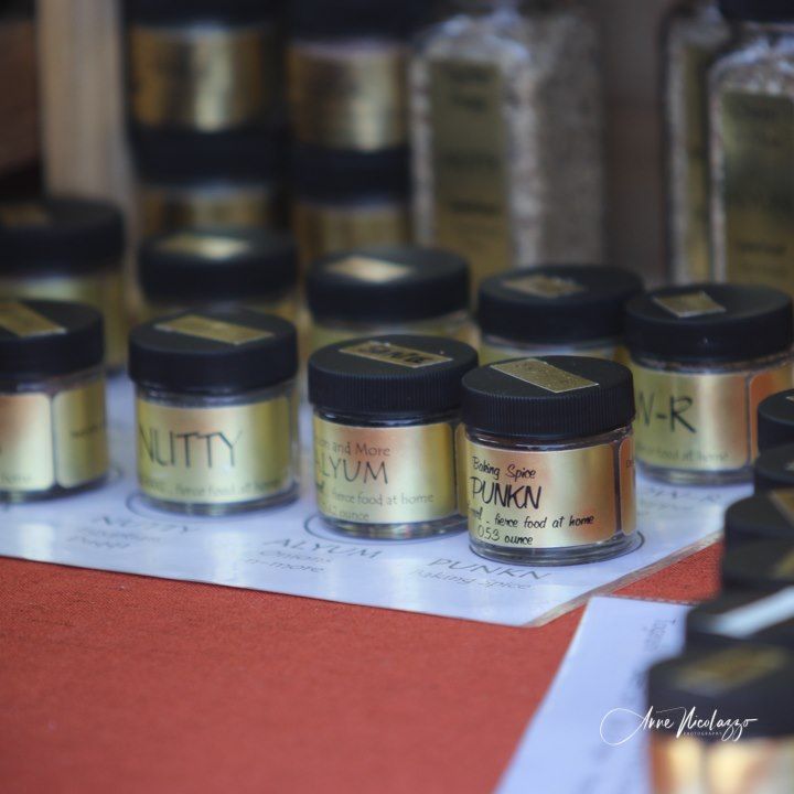 A bunch of jars with one that says nutty on it