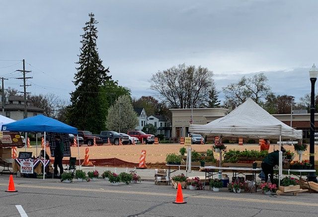 A group of tents are set up on the side of the road