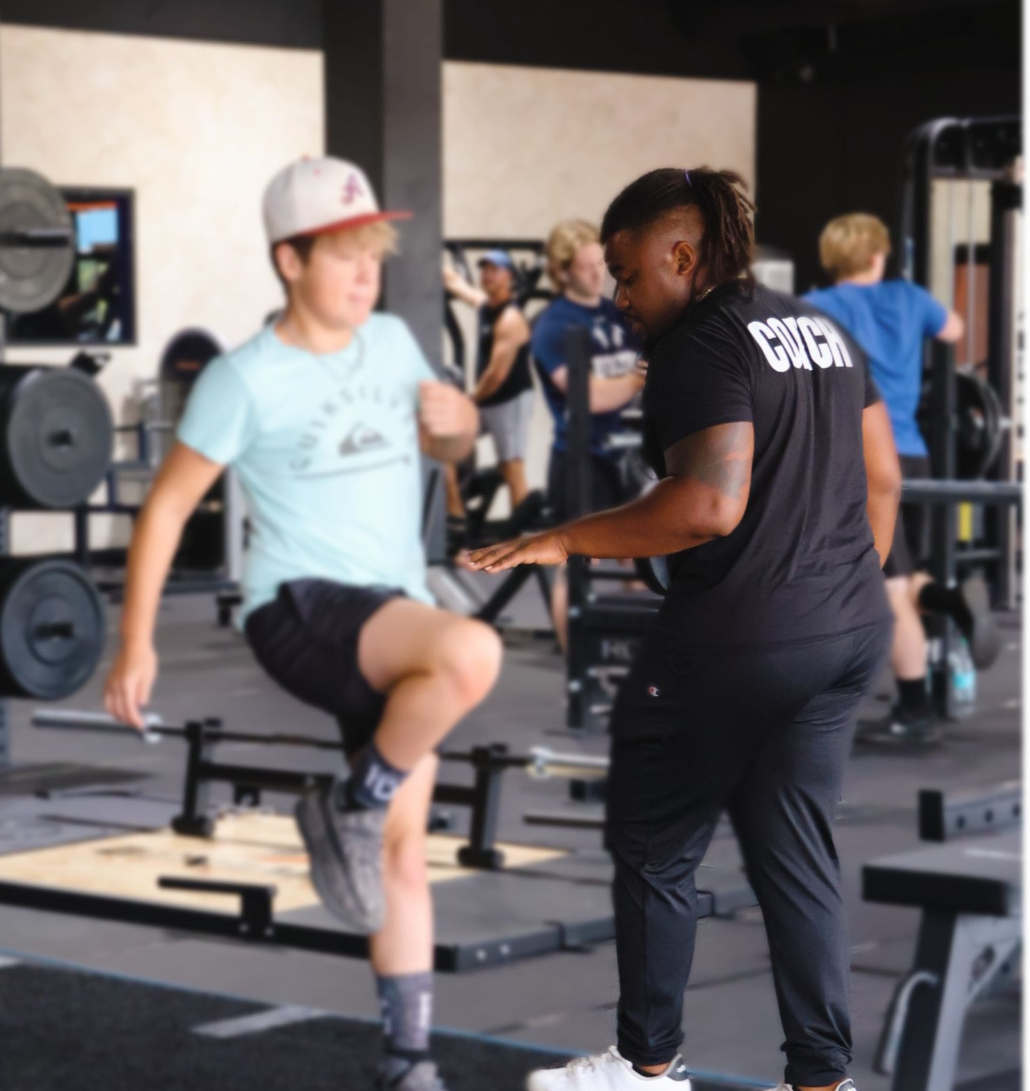 Personal trainer coaching athlete at Dynamis Athletics