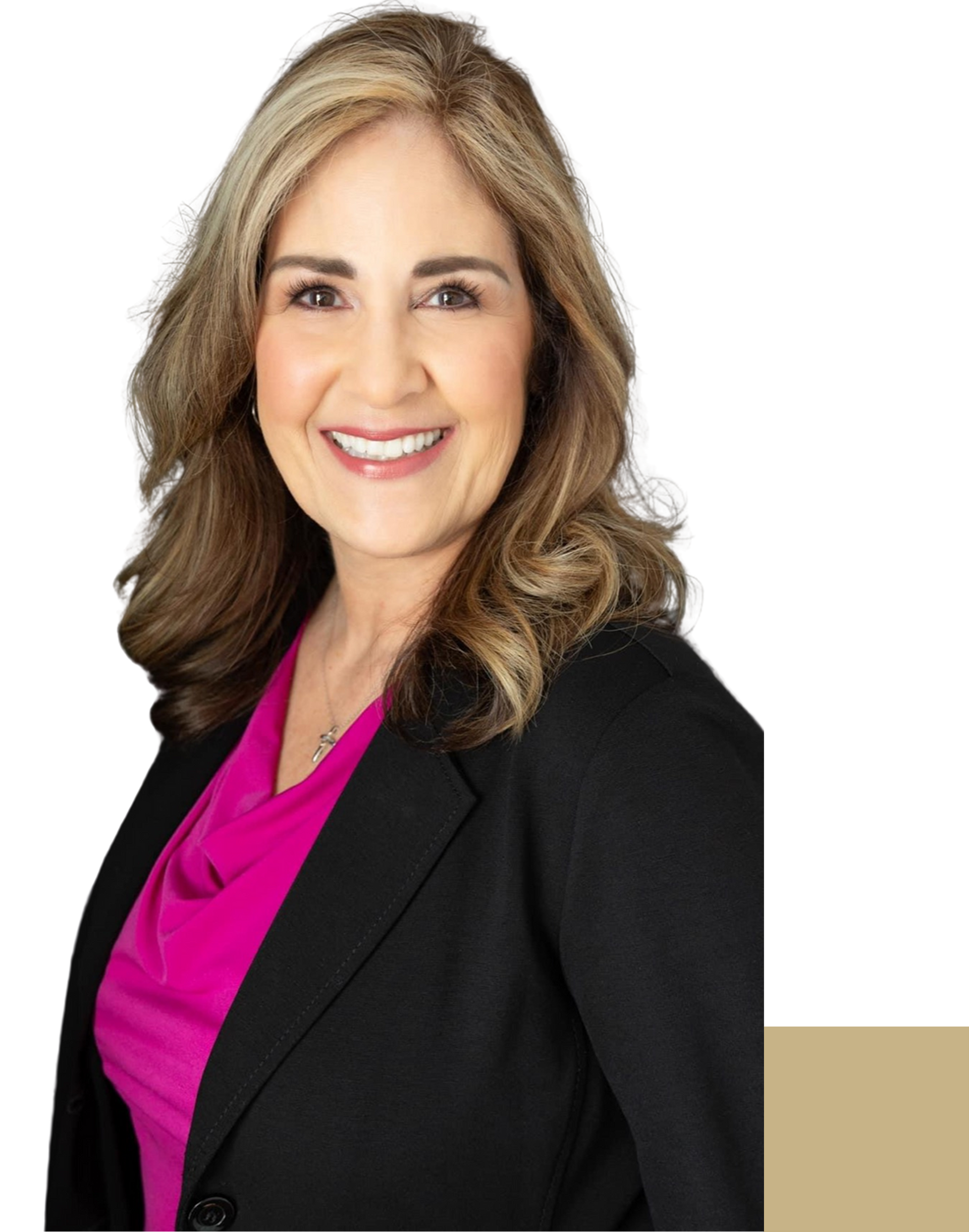 A woman wearing a black jacket and a pink shirt smiles for the camera