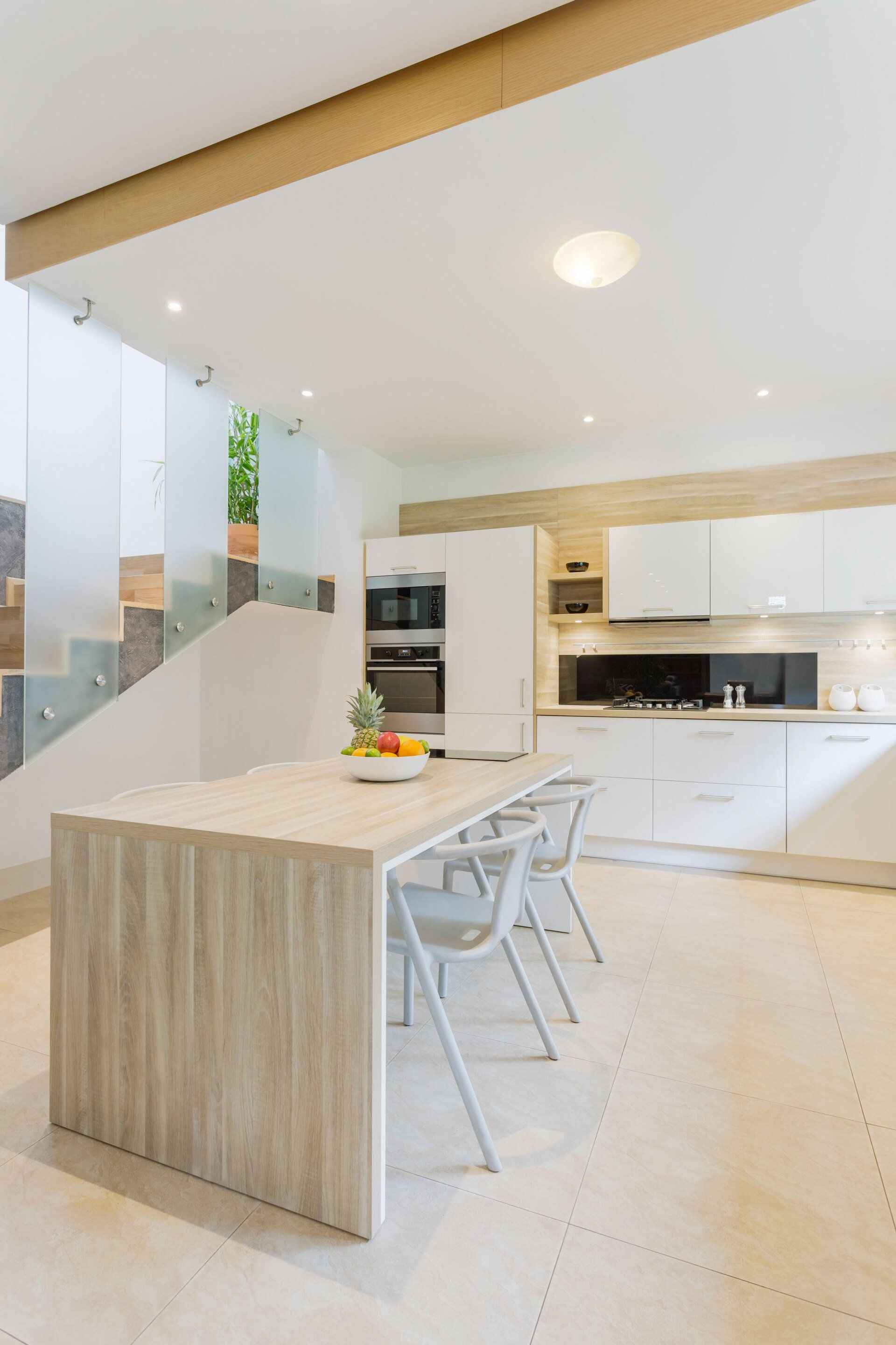Kitchen With Countertop & Bar Stools — Newcastle, NSW — Simply Genuine Skylights & Ventilation