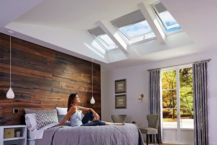 Woman in Bedroom — Newcastle, NSW — Simply Genuine Skylights & Ventilation