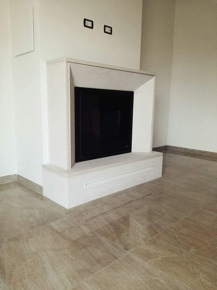 Cornice camino in marmo bianco