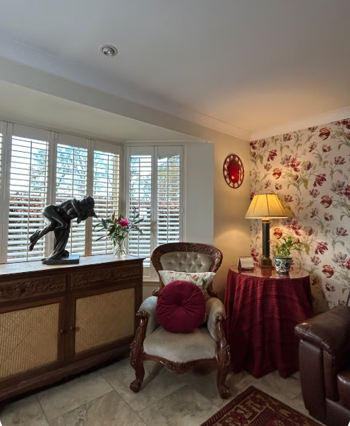 View from kitchen through French doors and into large garden