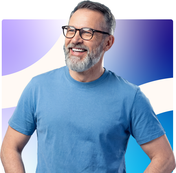 Smiling man in glasses and blue T-shirt against a blue and purple abstract background