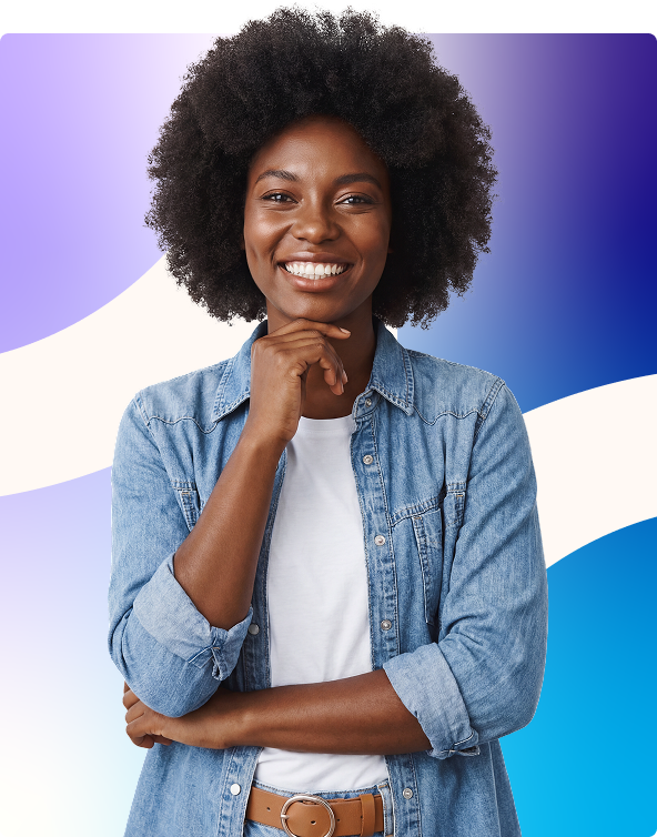 Smiling person in a denim shirt with arms crossed against a blue and purple abstract background