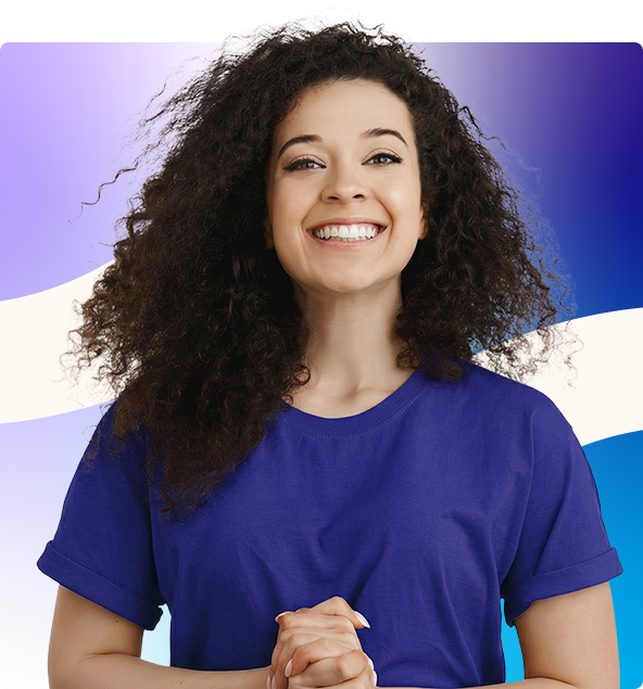 Smiling man with folded arms in a blue sweater against a white, purple, and blue abstract background
