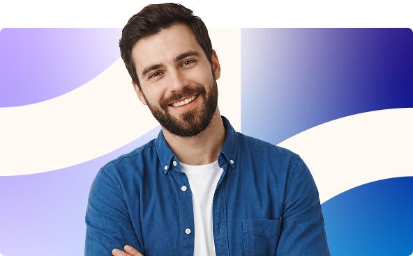 Smiling man with folded arms in a blue sweater against a white, purple, and blue abstract background