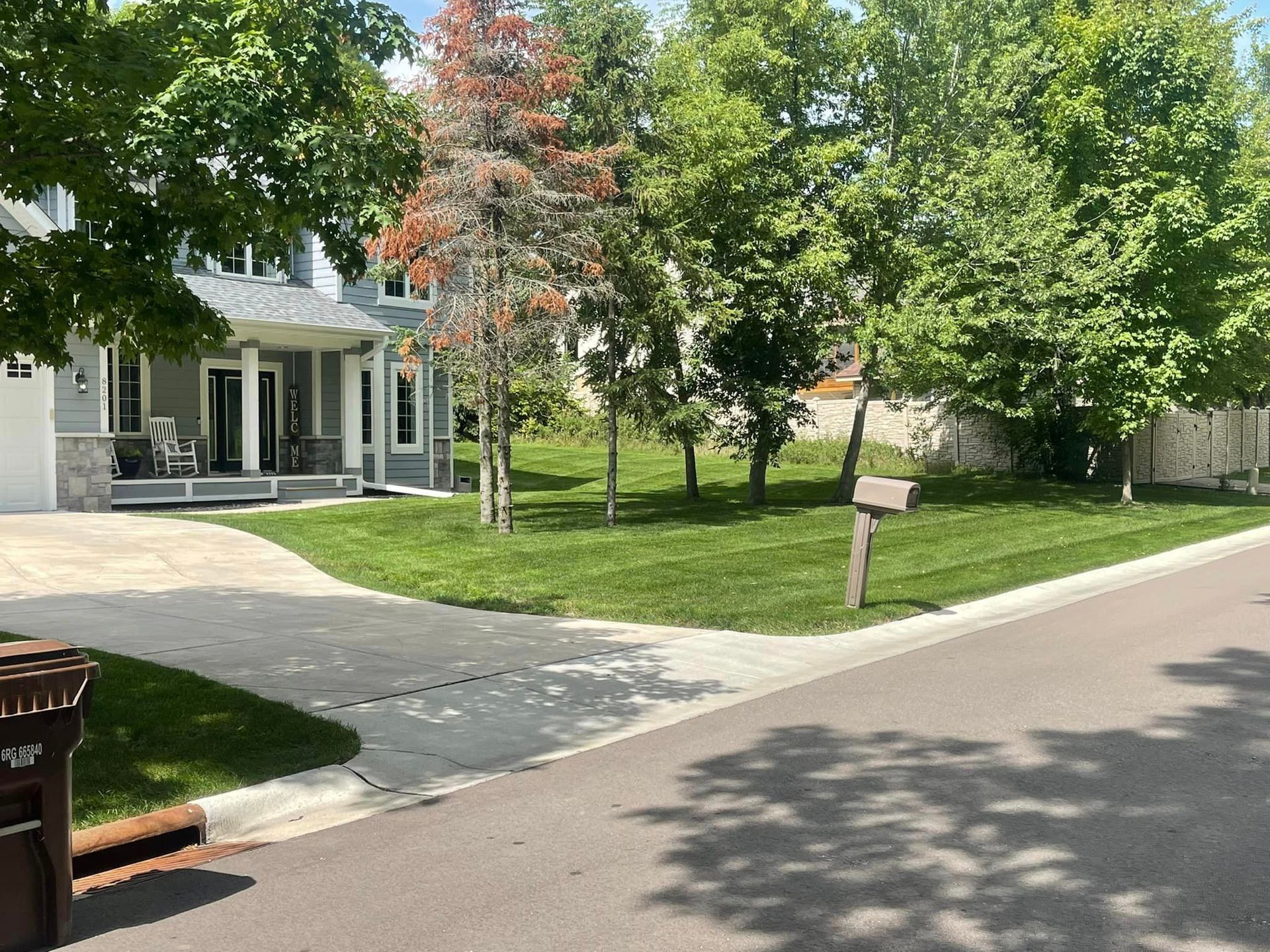 House landscaping - Hamel, MN - Mama's Boys Lawn and Landscaping LLC