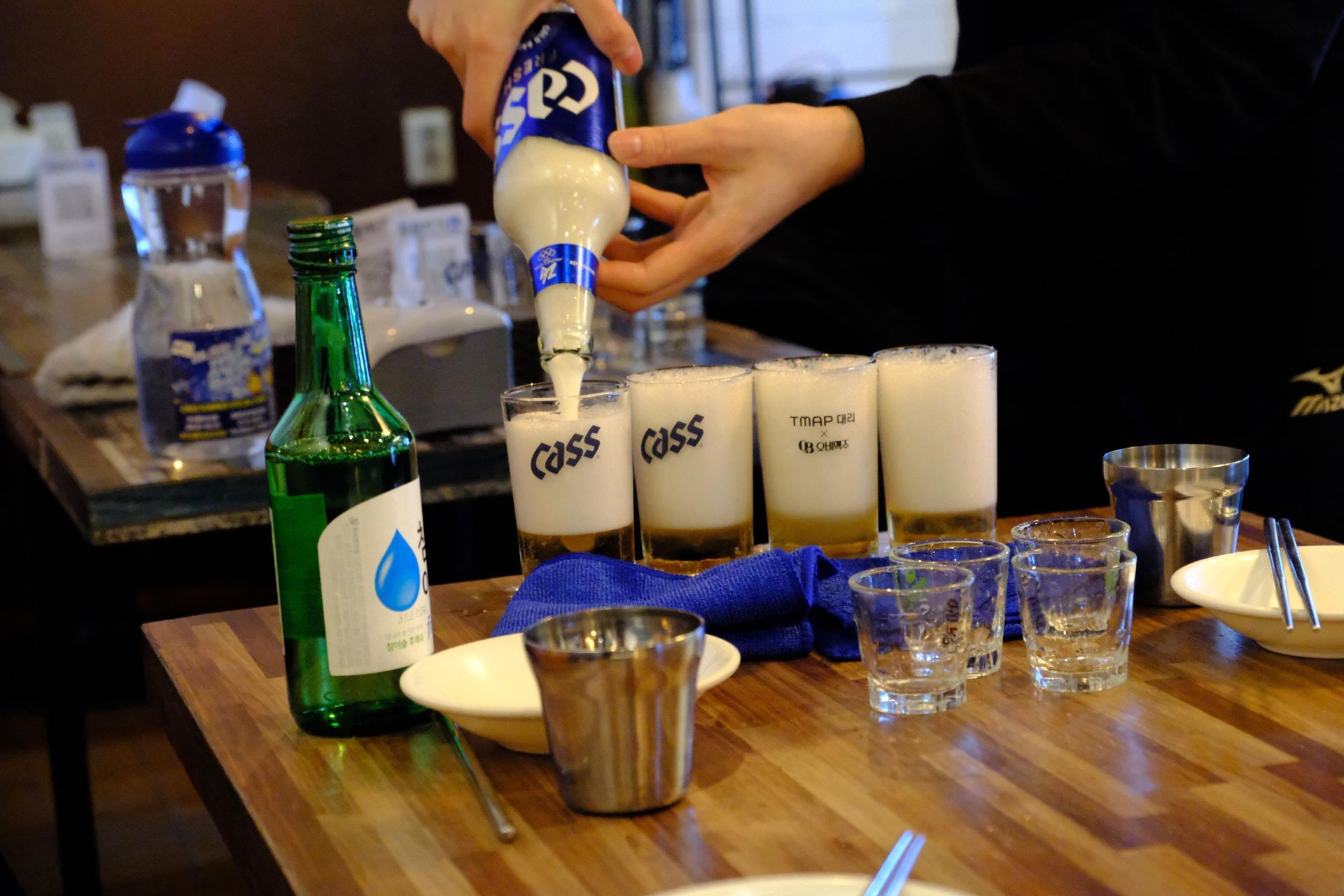 Soju bomb game during Korean nightlife in Seoul