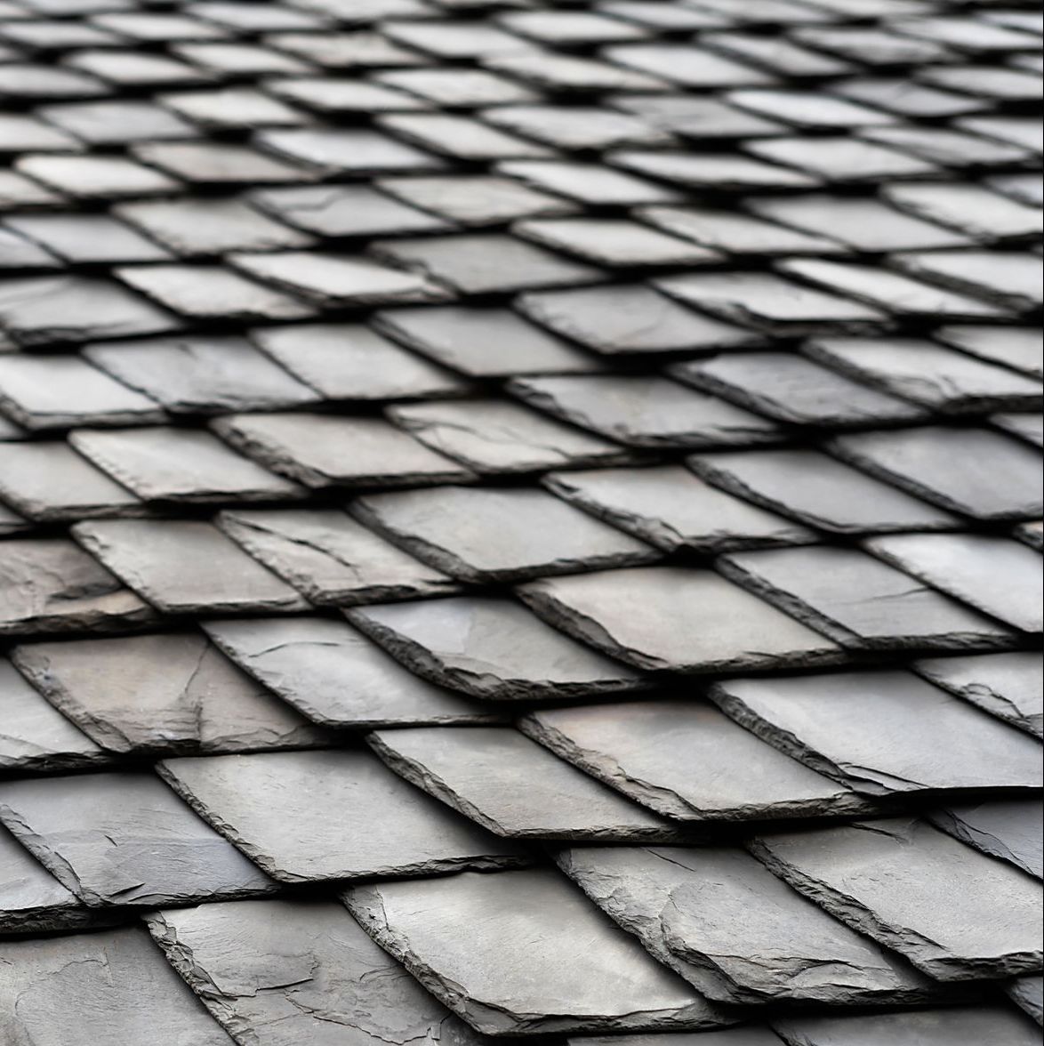 A close up of a roof made of slate tiles