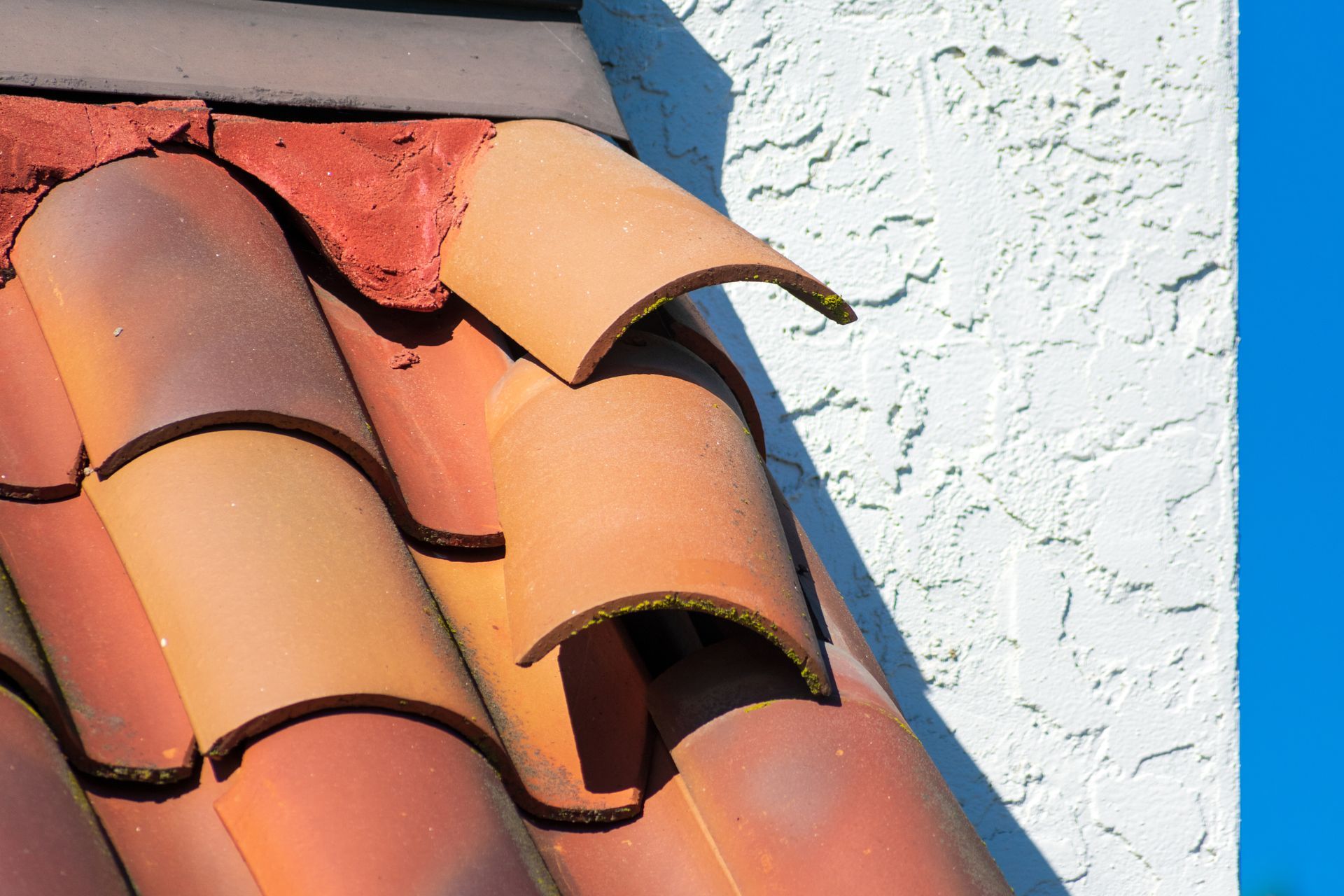 A close up of a roof with a hole in it