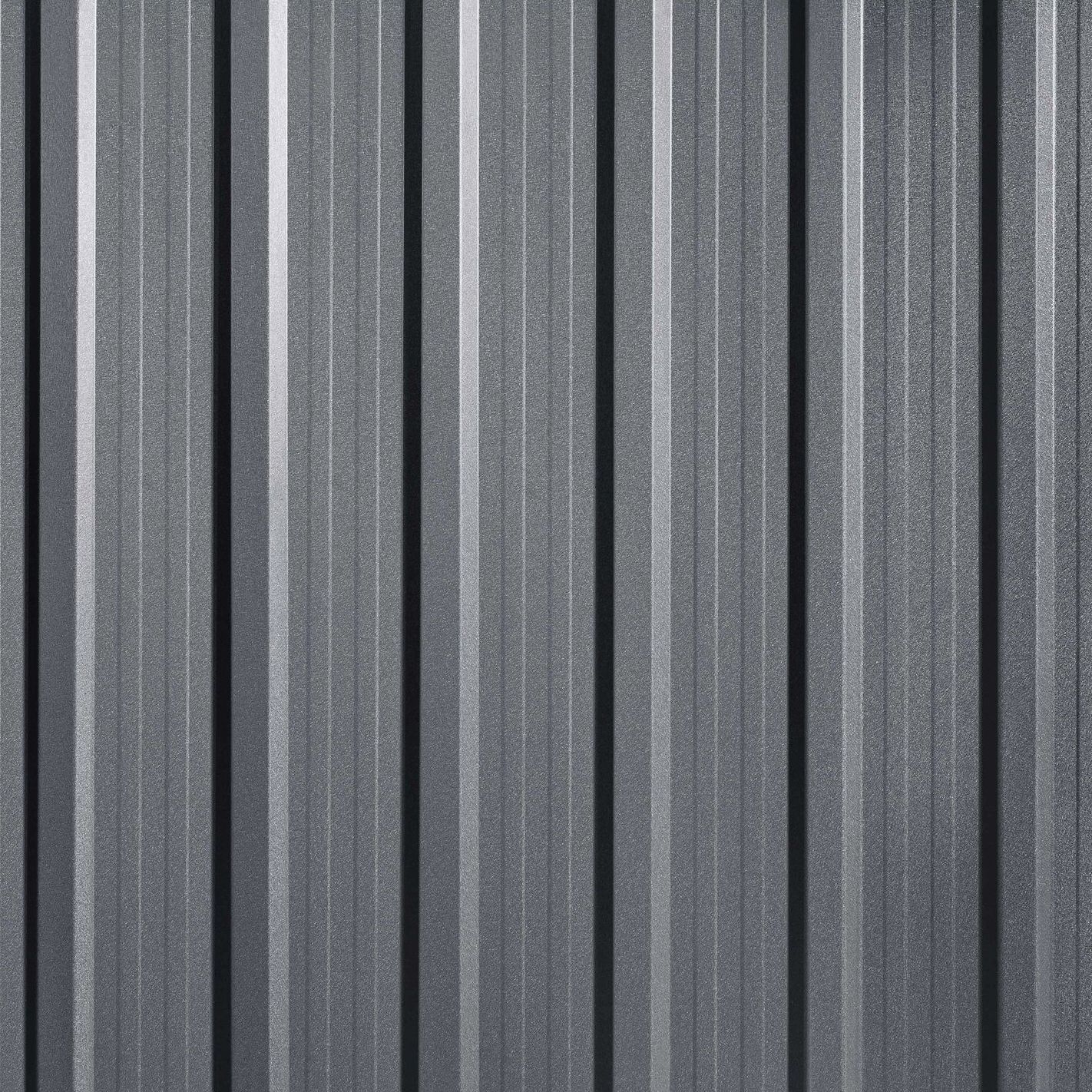 A close up of a gray metal wall with a striped pattern.
