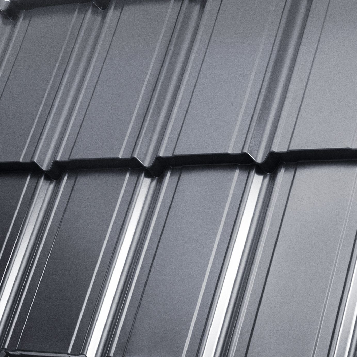 A close up of a gray metal roof