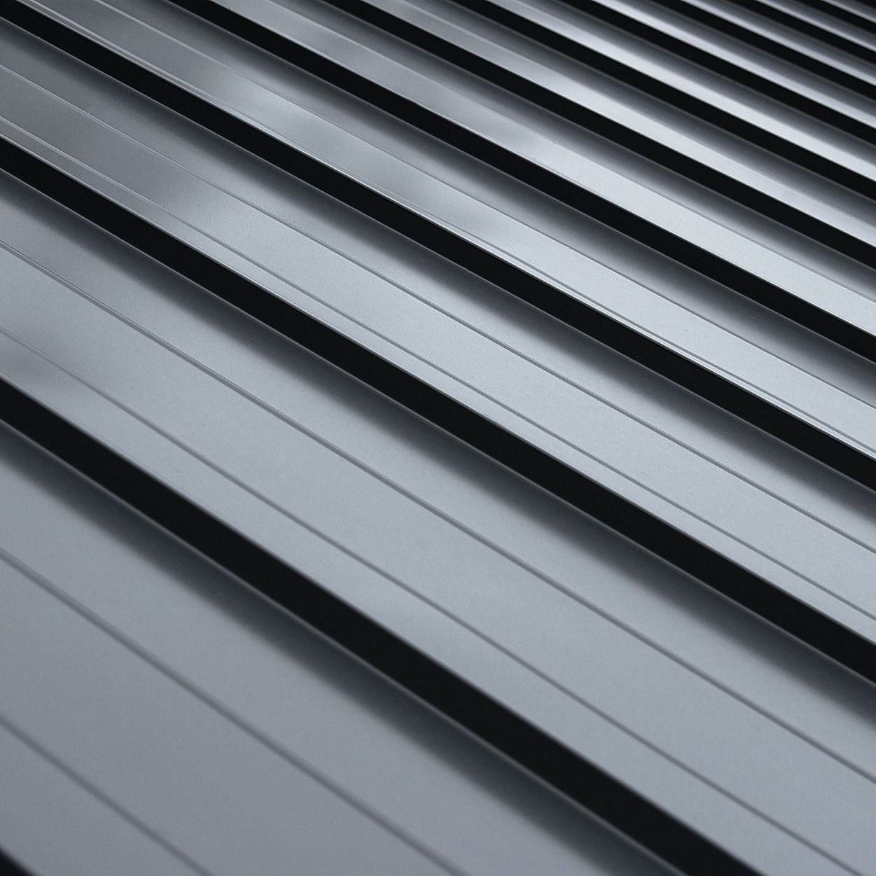 A close up of a gray metal roof