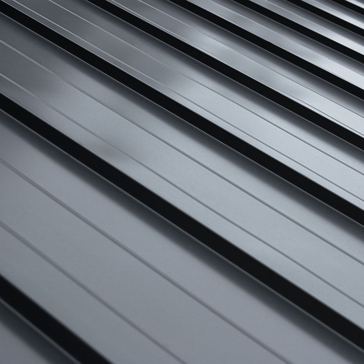A close up of a black metal roof