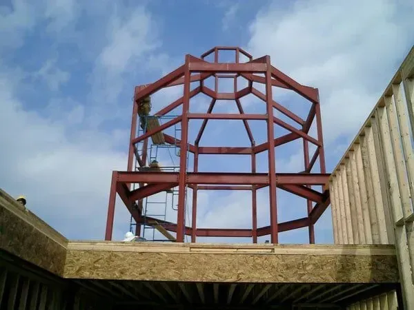 A Large Metal Structure With A Blue Sky In The Background — Albertson, NY — Patsy Strocchia & Sons Ir
