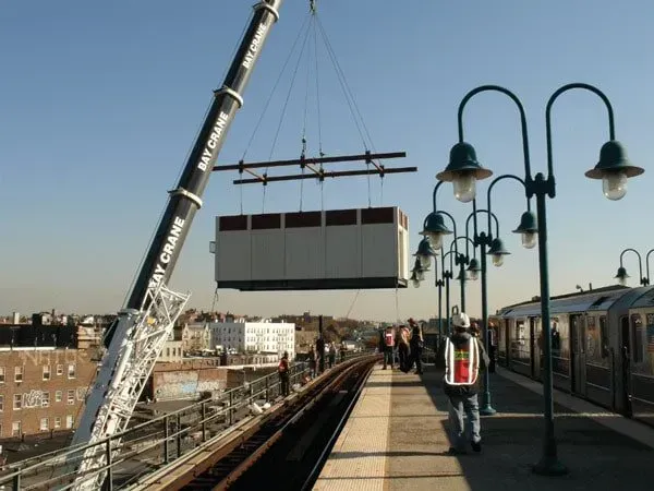 A Very Large Crane Is Lifting A Very Large Box — Albertson, NY — Patsy Strocchia & Sons Ir
