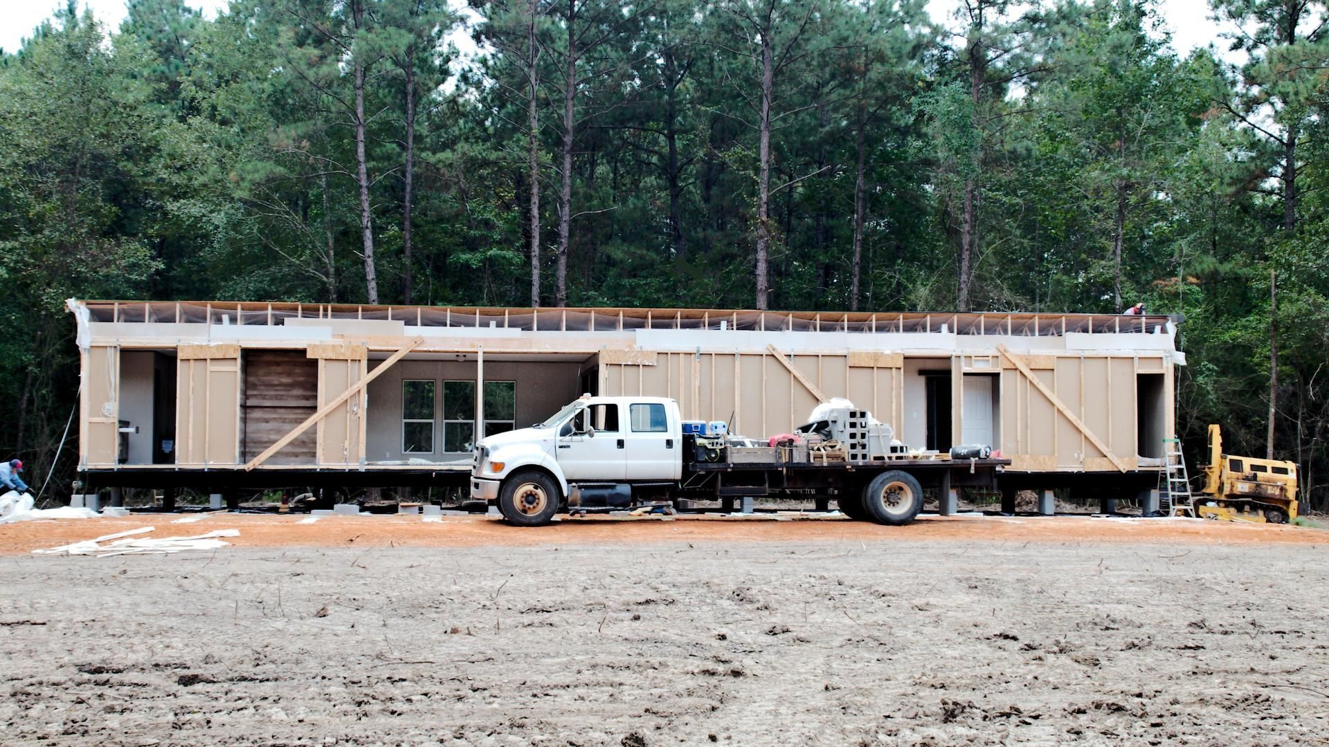 Manufactured home being prepared for installation.
