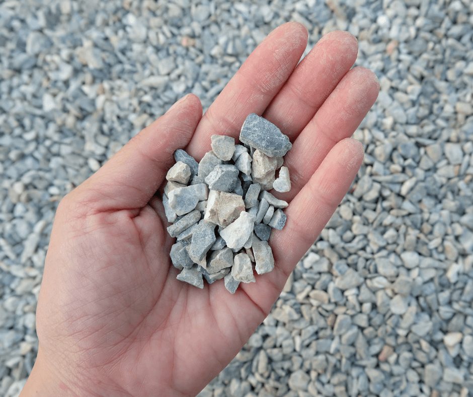 holding gravel in hand