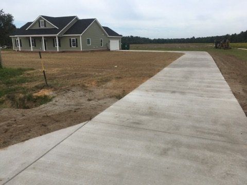 newly installed home concrete driveway