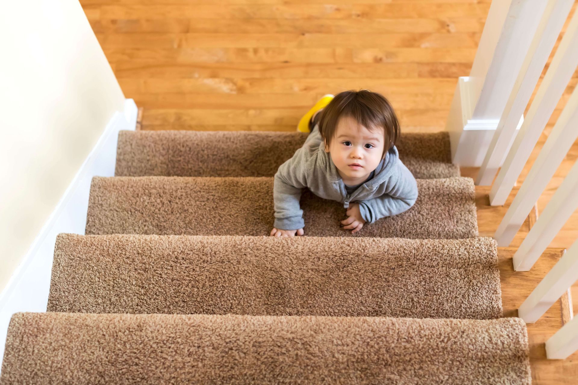 stairway safety, banister, stairwell, prevent climbing, stair safety in cary nc