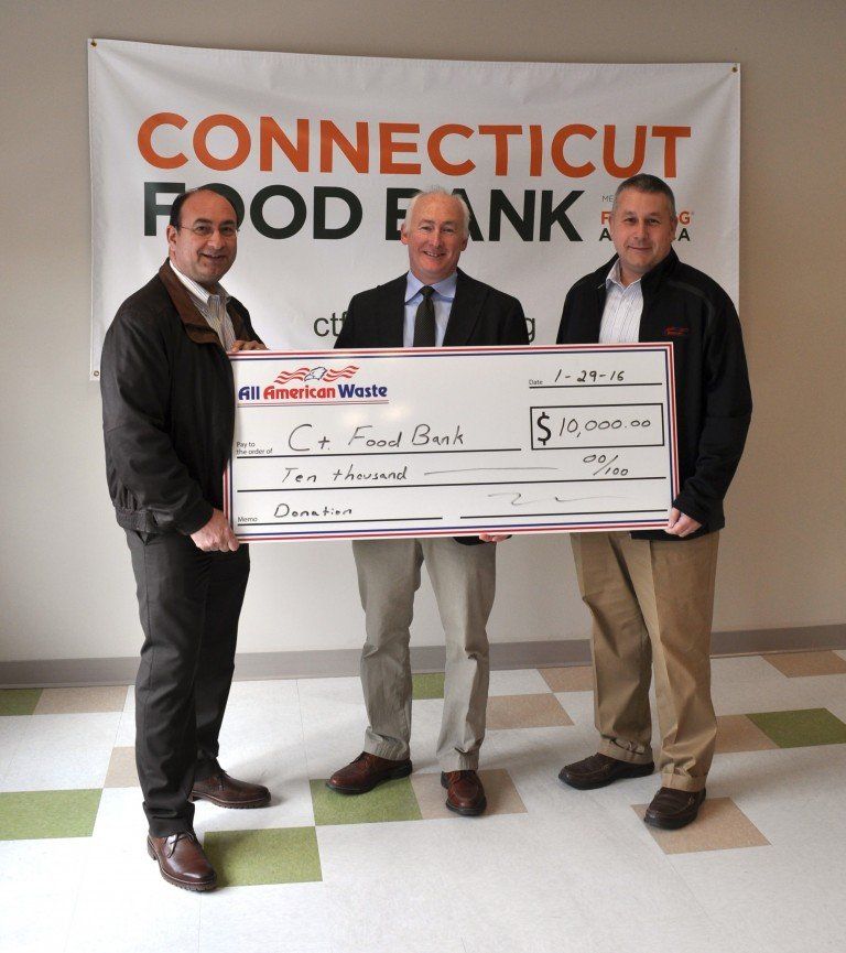 Ken Vallera, Director of Sales & Operations & Joe Engravalle, Major Account Manager of All American Waste presented a donation to the Connecticut Food Bank.