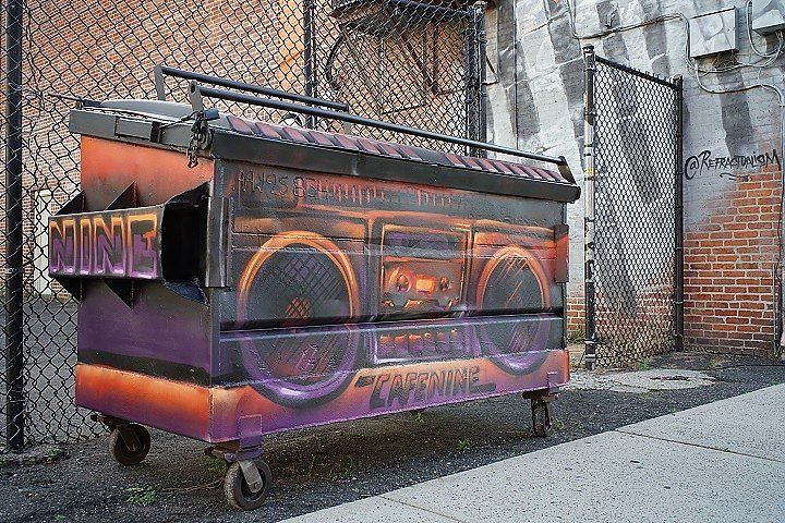 boom box painted on a Dumpster