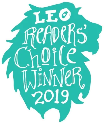 Teal lion silhouette with white text: 