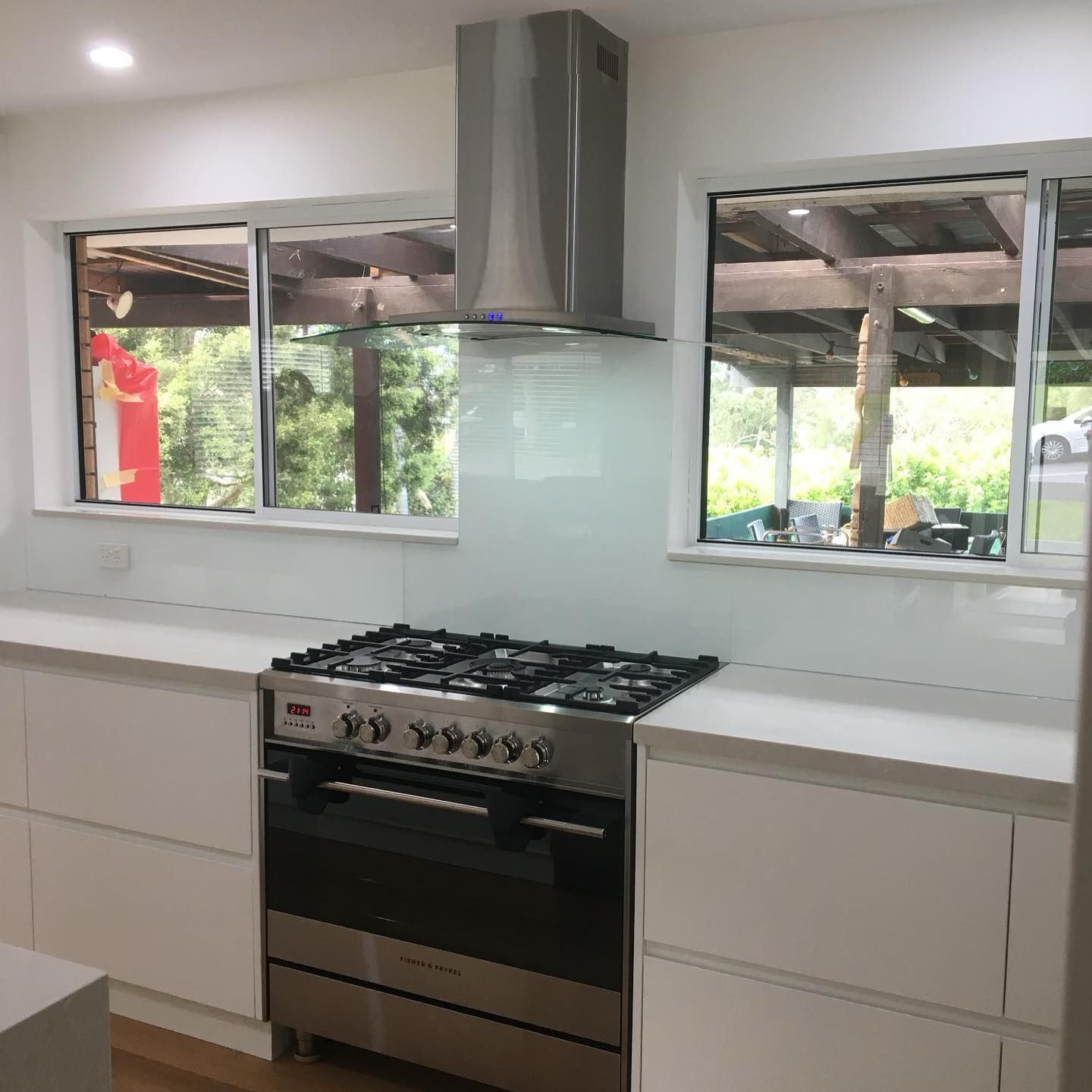 A Kitchen With a Stove, Oven, and Two Windows — Tuggerah Lakes Glass In Terrigal, NSW