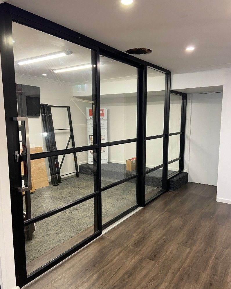 Black-framed Glass Wall, Separating Two Areas — Tuggerah Lakes Glass In Tumbi Umbi, NSW