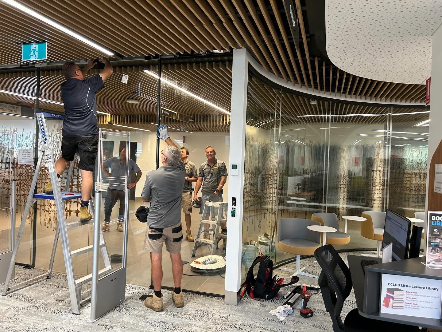 Workers Doing Glass Replacement