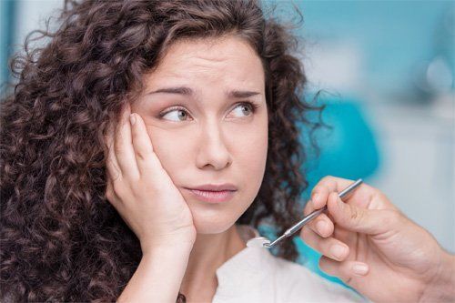 Teen Having a Toothache — Indianapolis, IN — Hollander, Jay A