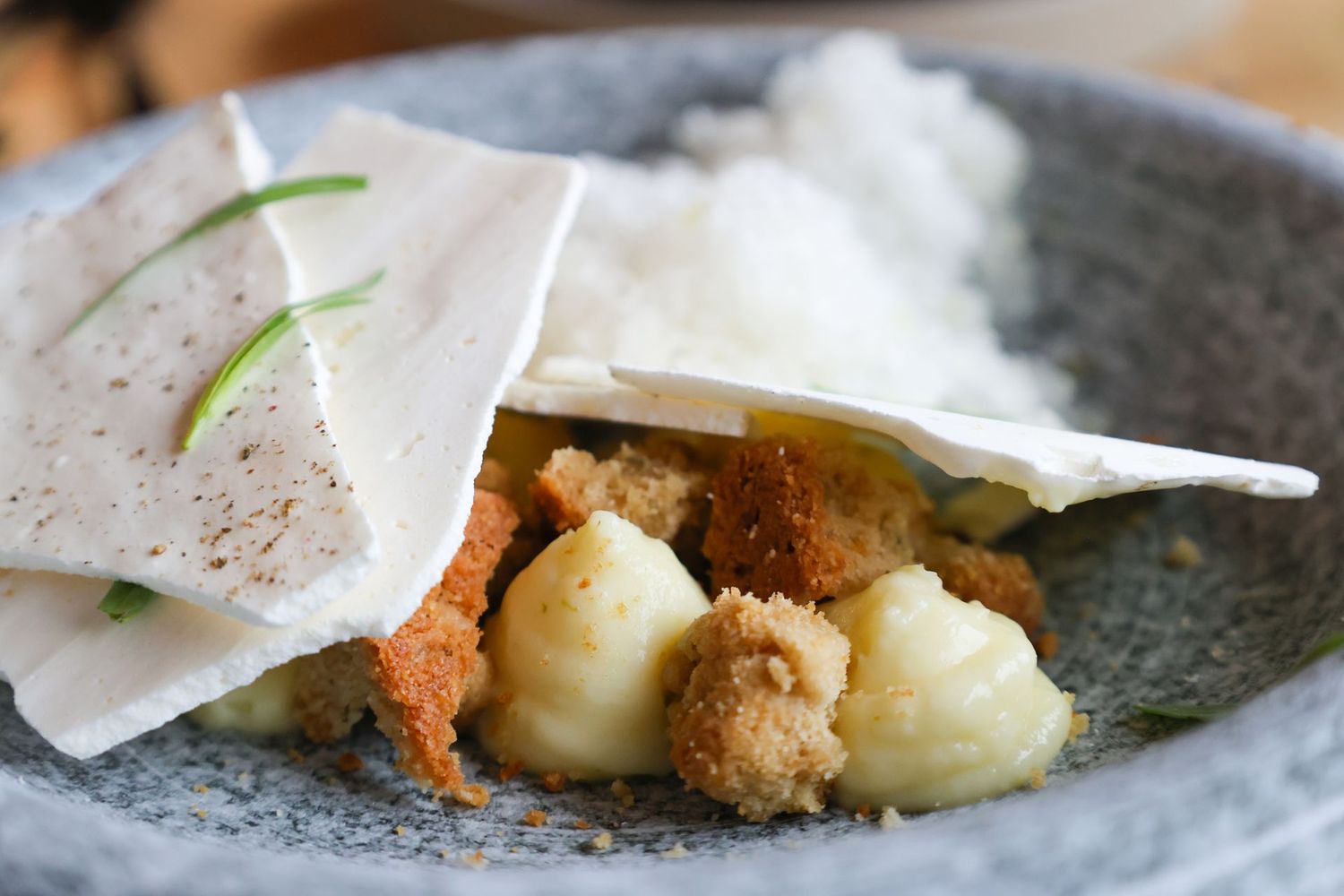 A close up of a plate of food on a table.