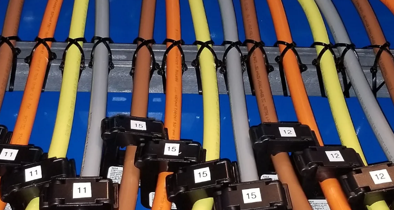 This picture of electrical wires links to the QA/QC Services page