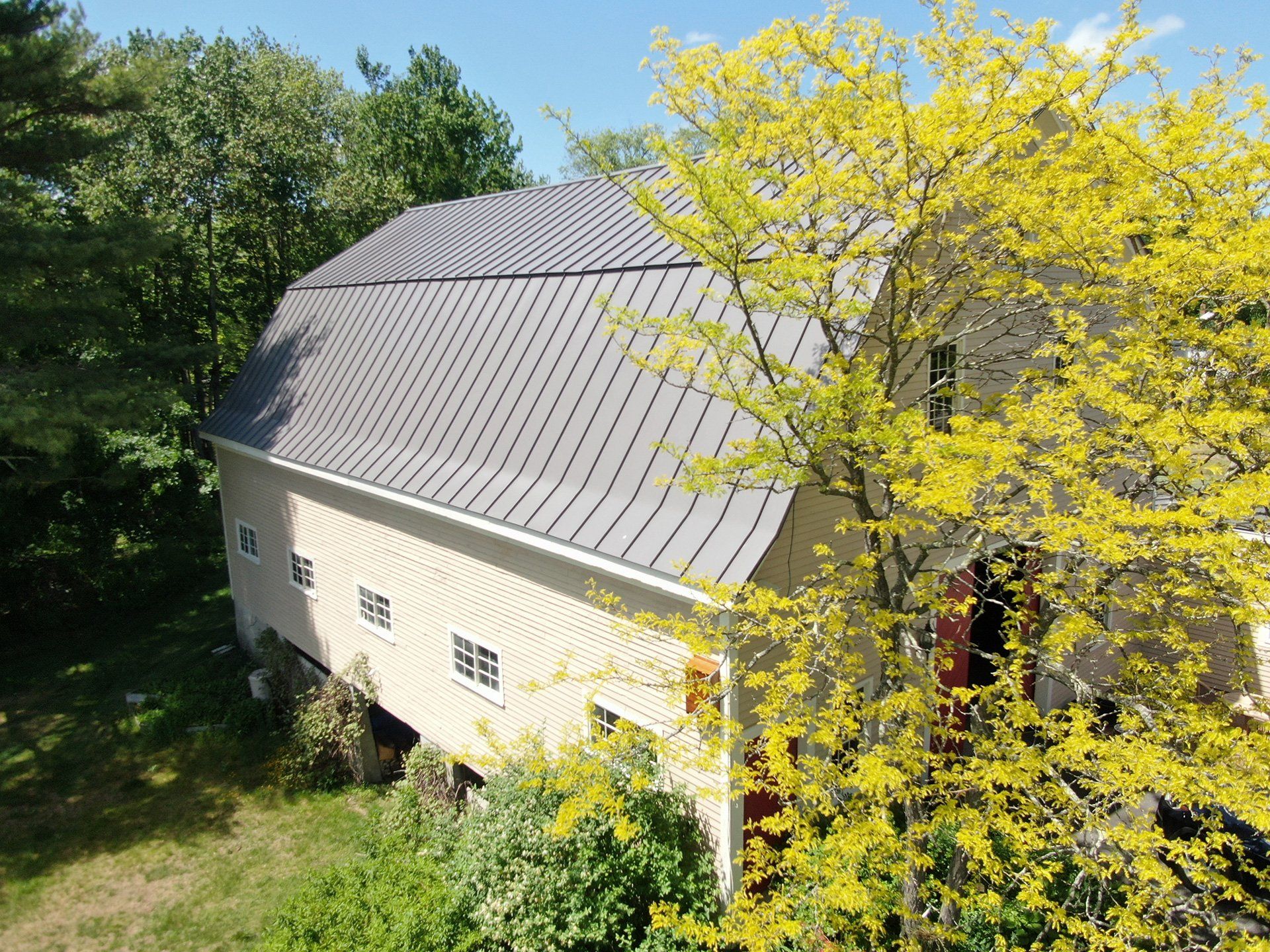 Silver Metal Roofing on Large Barn