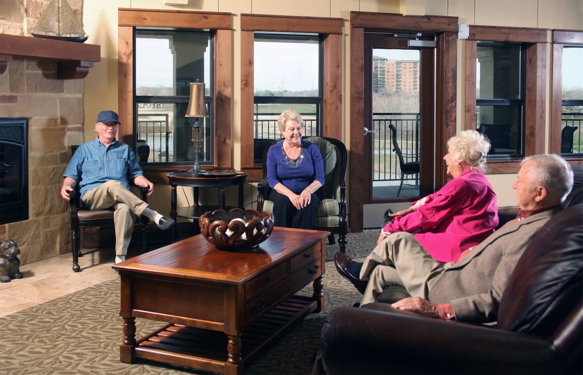 A living room filled with furniture and a fireplace