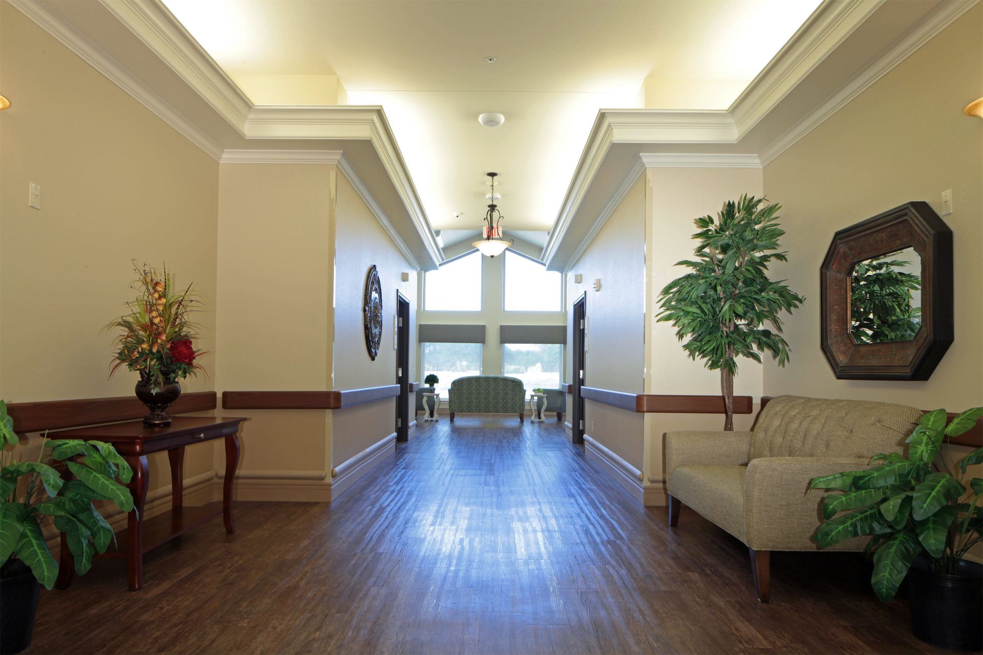 A private resident room or suite interior Entry area with personalization, Clear separation between private and shared space