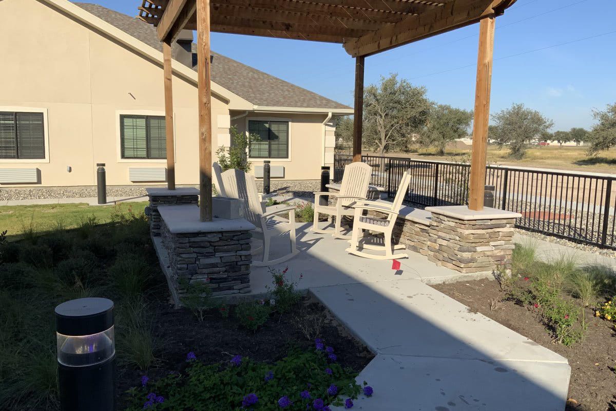 A courtyard porch, with strong daylight from a senior living project from rheinlander