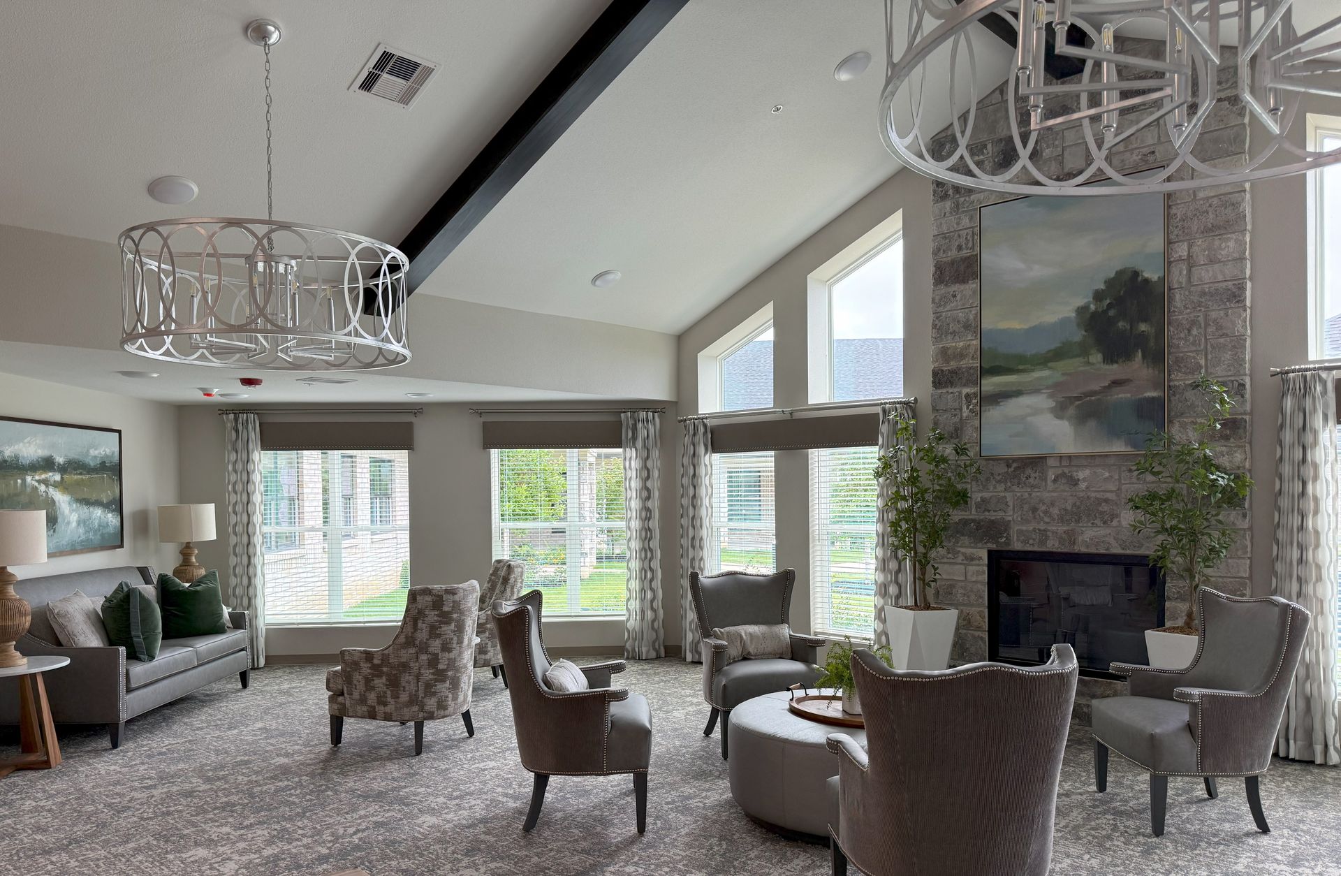 A living room filled with furniture and a fireplace