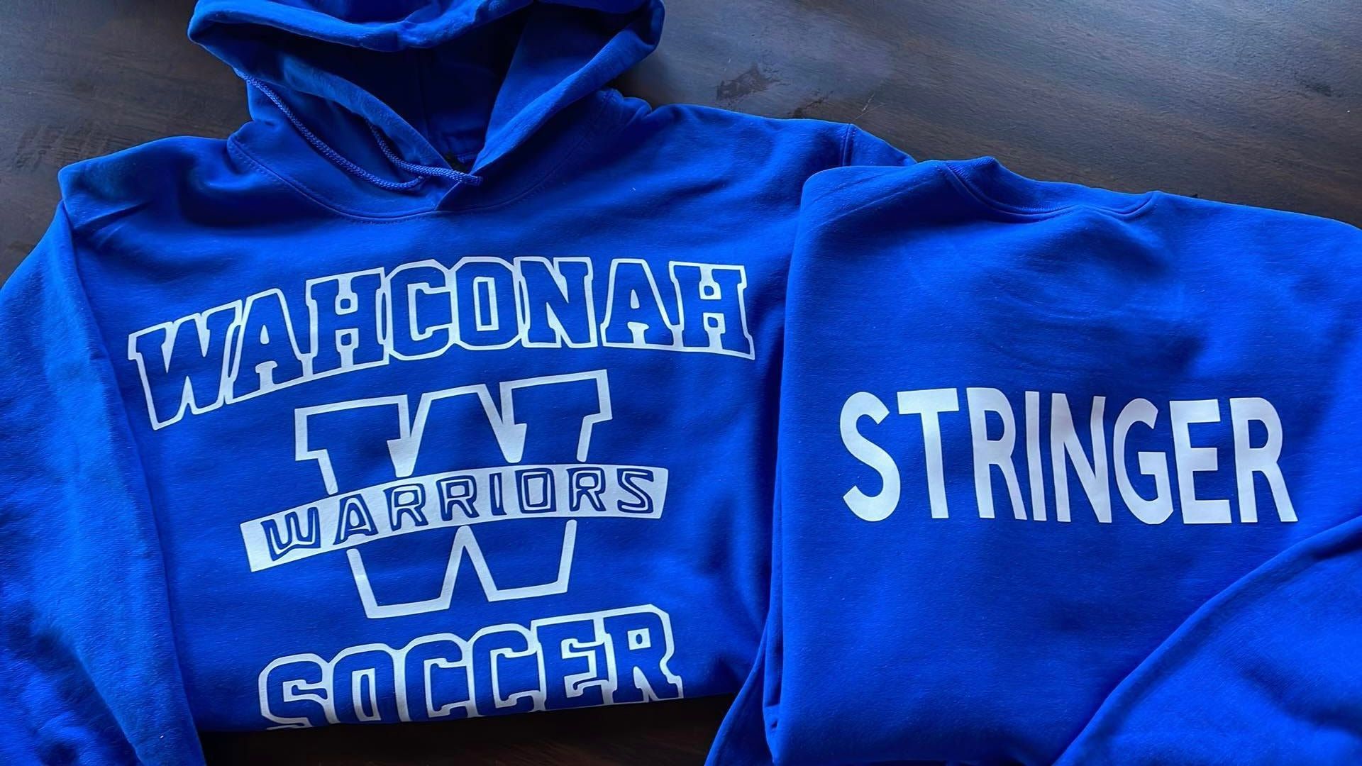Bright blue Wahconah Warriors soccer hoodie with the name 